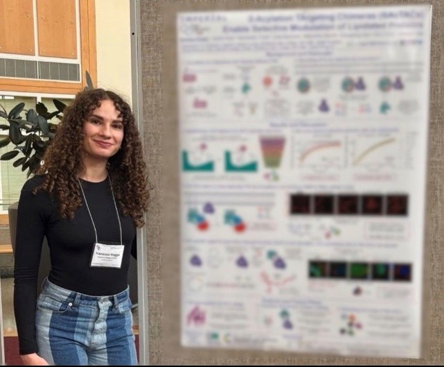 The winner and their poster.