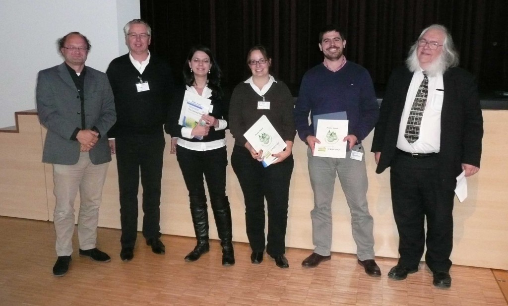 Poster prize winners from the 'Green Solvents for Synthesis' conference receiving their prizes from the organising committee