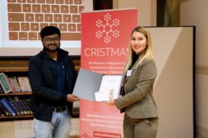 Nilesh Gajanan Bajad receiving a poster prize