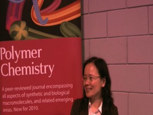 Photograph of Jian Ping Gong as she talks to Polymer Chemistry