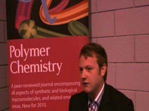 Photograph of Jay Syrett as he talks to Polymer Chemistry 